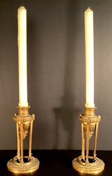 A Pair Of Bronze Neoclassical Candlesticks