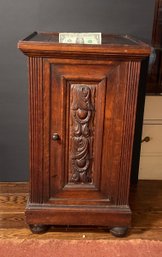 Antique Heavily Carved Quatersawn Oak  Cabinet With Pullout Shelf