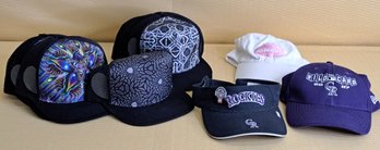 Two Rockies Baseball Caps, An All Star Cap, And Some Generic Caps