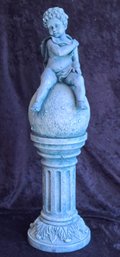 Lovely Cherub Sitting On A Pedestal