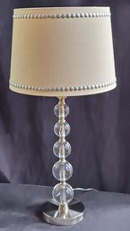 28 Inch Stacked Crystal Lamp On Brushed Silver Tone Metal Base With Studded Shade