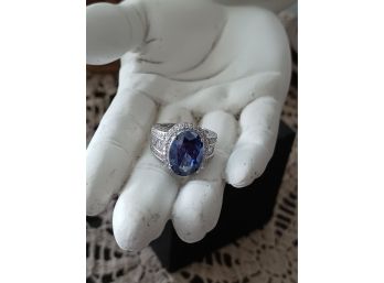 Large Rhodium Over Sterling Silver Tanzanite Colored CZ Center Stone Ring
