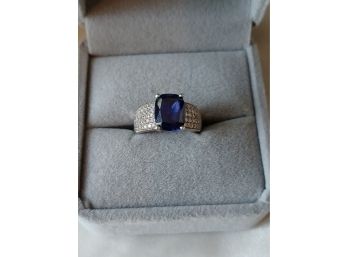 Rhodium Over Sterling Silver CZ Tanzanite Color And Clear Stones Ring
