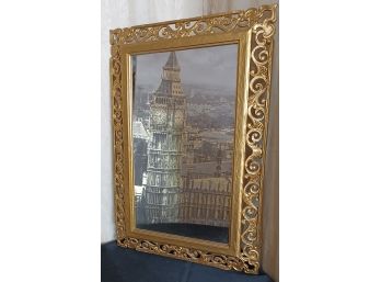Gold Colored Ornately Framed Mirror