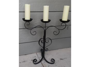 Black Wrought Iron Scroll Candle Holder With Three Ivory Pillar Candles