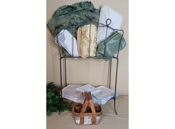 Metal Stand Filled With Table Linens