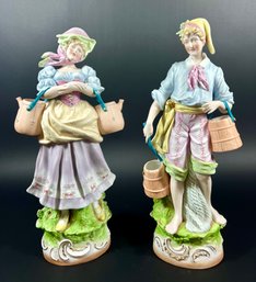 A Pair Of Capodimonte Bisque Figurines