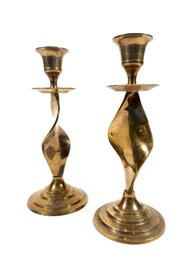 A Pair Of Solid Brass Twisted Candlesticks