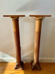 A Pair Of Early Wooden Columns With Platforms