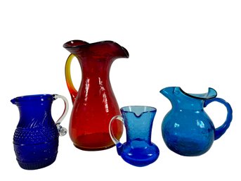 Grouping Of (4) Art Glass Pitchers