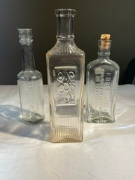 Bottles Lot With P&T Founded 1840 Bottle With Vine Design