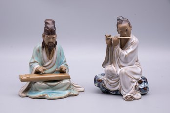 A Pair Of Chinese Porcelain Figurine Of Men Playing Music