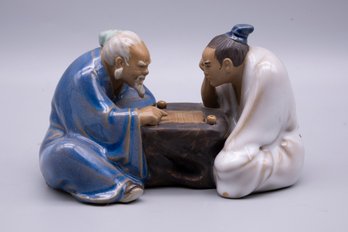 Chinese Porcelain Figurine Of Men Playing Chinese Chess