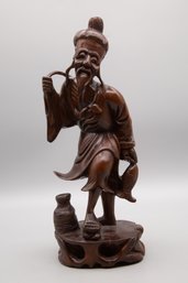 Wood Carving Of Ancient Chinese Fisherman