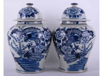 A Pair Of Antique Blue & White Porcelain Urns
