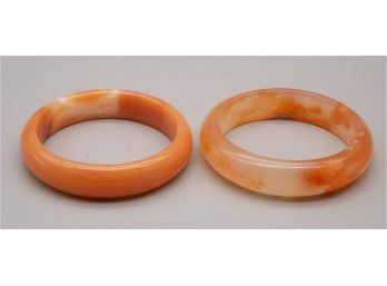 Pair Of Orange Bracelets