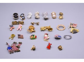 Assort Of Earrings And Pins