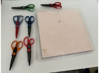 Stack Of Scrapbooking Paper & 6 Shape Scissors