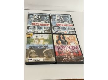 4 DVDs - Grey's Anatomy, Burlesque, Pearl Diver
