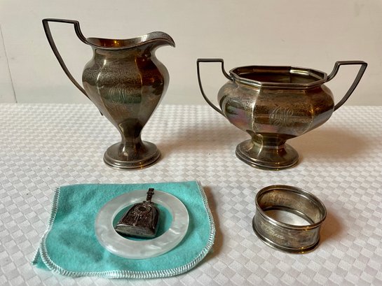 Sold at Auction: ANTIQUE STERLING SILVER SERVING PIECES - Two