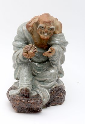Chinese Seated Mudman Figurine