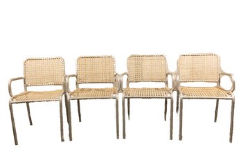 Set Of Four Aluminum And Leather Arm Chairs