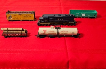 HO 3509 Locomotive, Box Cars, Log Car And Oil Tank Car #36