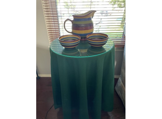 LONGABERGER POTTERY BRIGHT MULTI COLOR STRIPE BOWLS AND PITCHER, LOT INCLUDES SIDE TABLE AND COVER