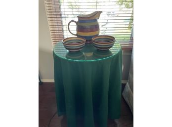LONGABERGER POTTERY BRIGHT MULTI COLOR STRIPE BOWLS AND PITCHER, LOT INCLUDES SIDE TABLE AND COVER