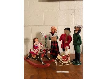 A Collection Of Vintage Signed The Carolers Figurines From Buyers Choice. Stand Platforms Are Marked And Signe