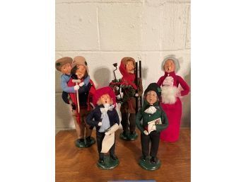 A Collection Of Vintage Signed The Carolers Figurines From Buyers Choice Stand Platforms Are Marked And Signed