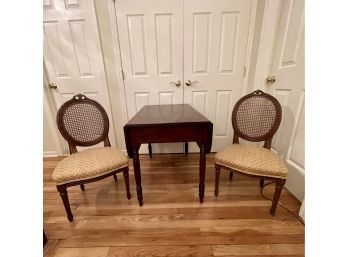 Pair Of French Louis XV Style Cane Back Arm Chairs And Antique Drop Leaf Table Circa 1840