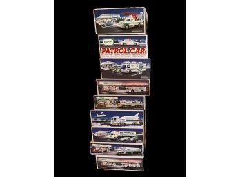 Hess - Collection Of Trucks And Cars 9 Brand New Boxes Never Opened