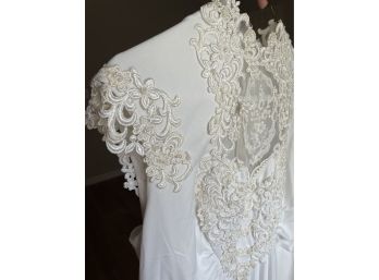 Incredible Hand-Crafted Wedding Gown With Embroidery On Bodice And A Bridal Veil With Fashionable French Lace