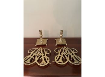 Lot Includes Pair Of Brass Trivet Queen Ann Cypher Williamsburg And Pair Of Candleholders