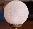 A Pair Of Frost Cracked Finish Globe Bronze Lamp
