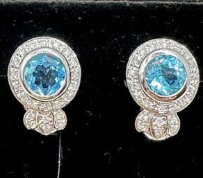 Pair Of Natural Diamond & Blue Topaz Earrings In 14KT WG