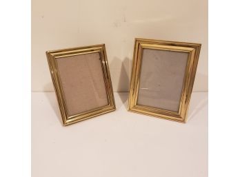 Pair Of Gold Colored Frames