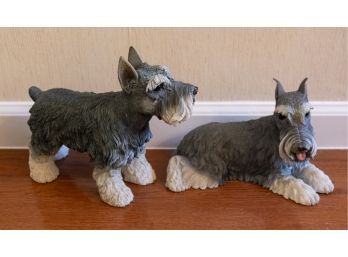 A Pair Of Dog Figurines
