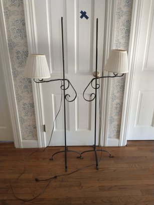 Two Wrought Iron Adjustable Floor Lamps