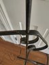 Two Wrought Iron Adjustable Floor Lamps