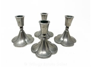 Four C. 1940s Just Anderson Pewter Candlesticks.