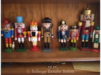 Eight Assorted Nutcrackers & Candle