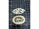 Two Russian Carved Bone Black Forest Style Brooches
