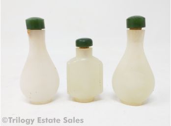 Three Jade Snuff Bottles