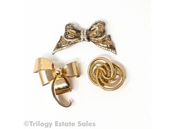 Three Brooches Bows Two Sterling Bows, And Gold Fill Concentric Rings