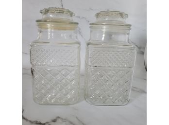Pair Of Two Covered Glass Jars