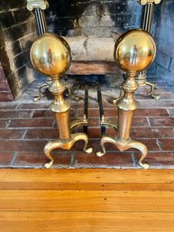 A Pair Of Antique Brass Cannonball Andirons