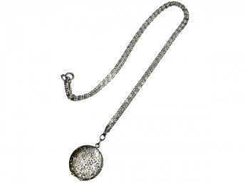 Silvered Metal Locket Necklace With Floral Heart Design