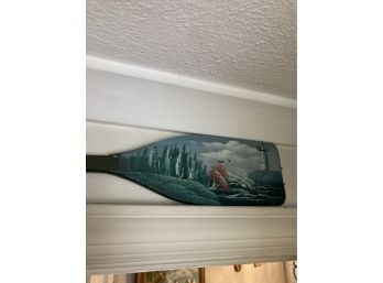 Small Wooden Paddle With Painted Lighthouse Scene.
